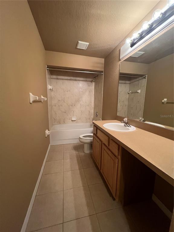 16016 Mulhatton Road Weeki Wachee, FL 34614 - Photo 10 of 14 a bathroom with a sink a large mirror and a bathtub