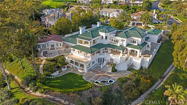 an aerial view of a house with a garden