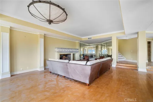a view of a livingroom with furniture and windows