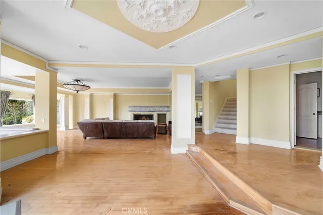 a large bathroom with a large mirror vanity and shower