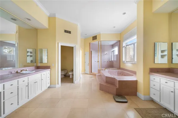 a view of room with floor to ceiling window and stairs