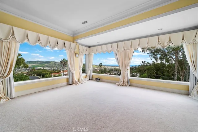 a bathroom with a granite countertop sink mirror and bathtub
