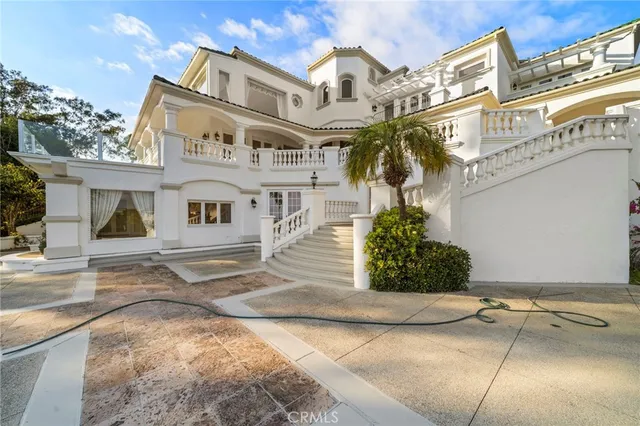 a view of swimming pool with a patio