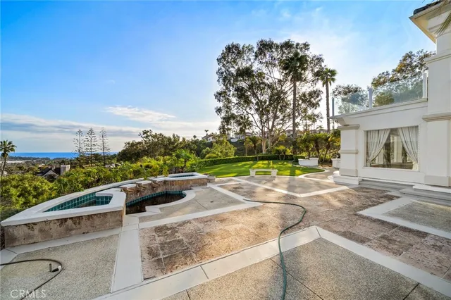 a view of a building with a yard