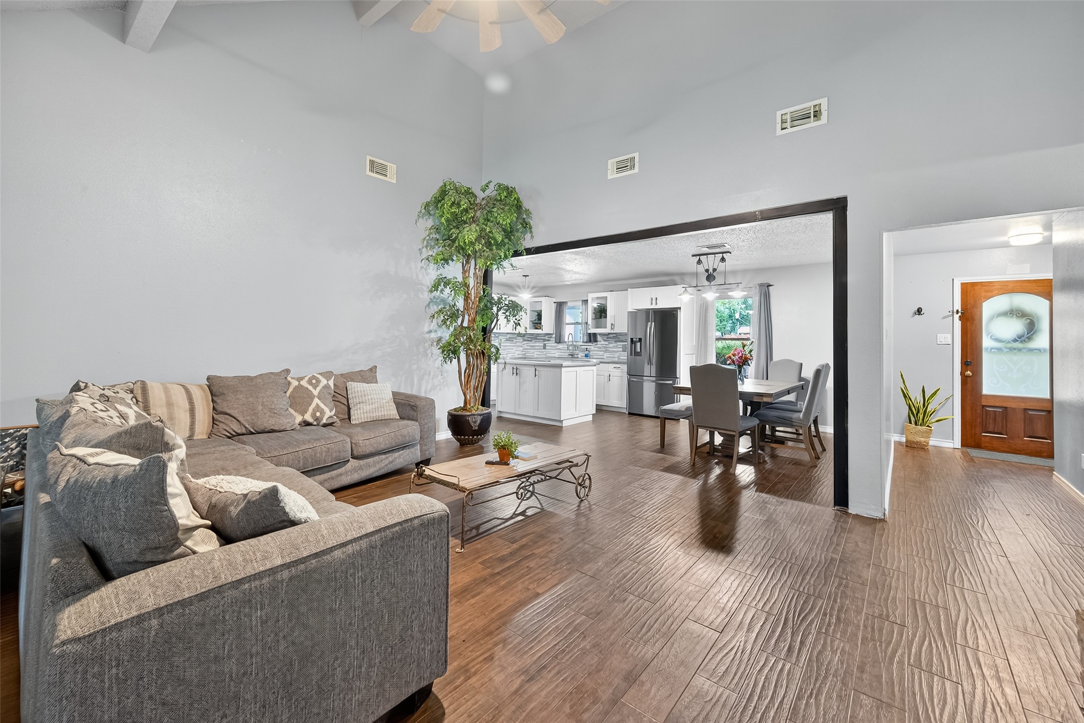 2103 Diane Street Pinehurst, TX 77362 - Photo 4 of 17 a living room with furniture and wooden floor