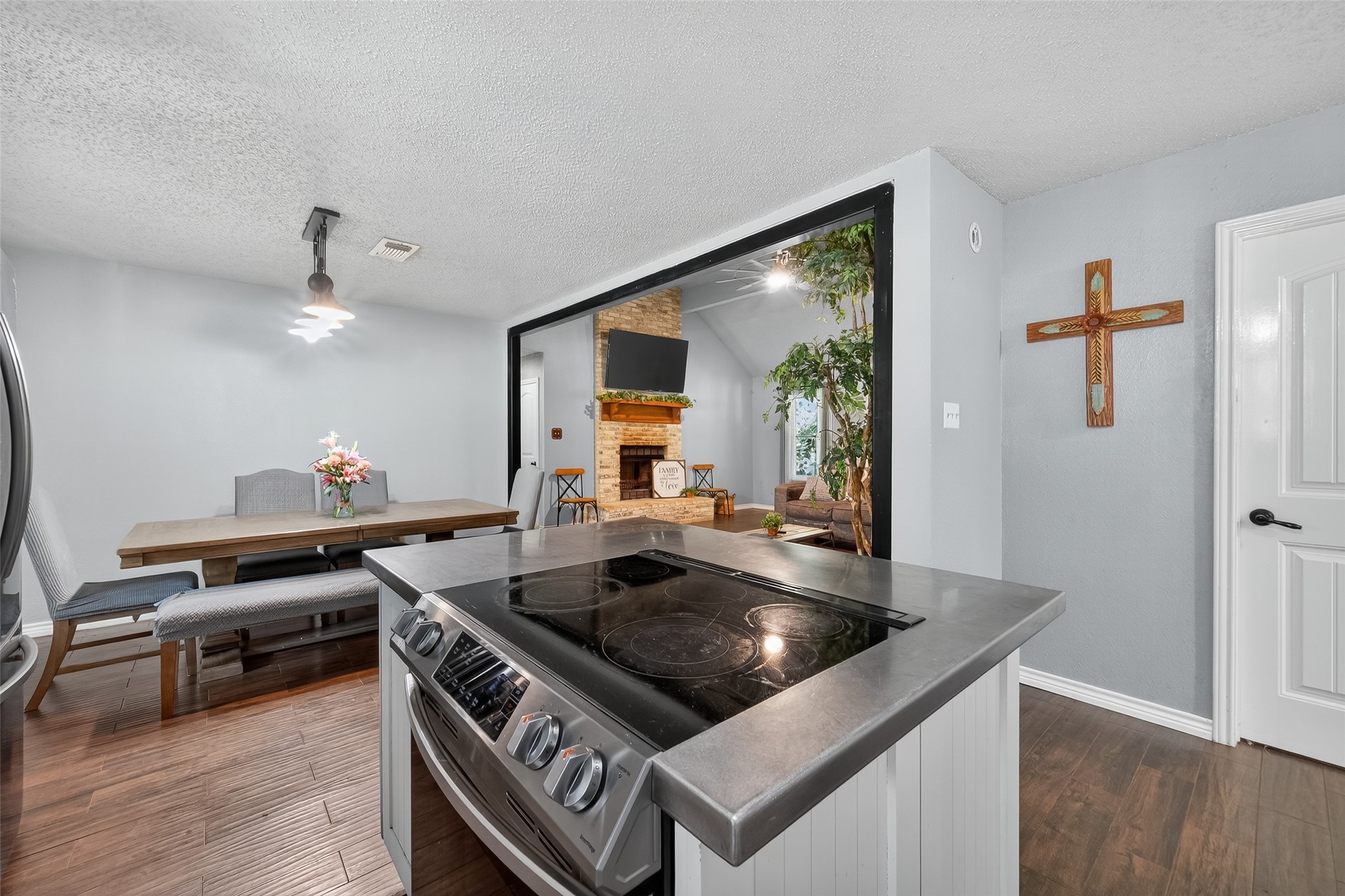 2103 Diane Street Pinehurst, TX 77362 - Photo 8 of 17 a living room with furniture and a wooden floor