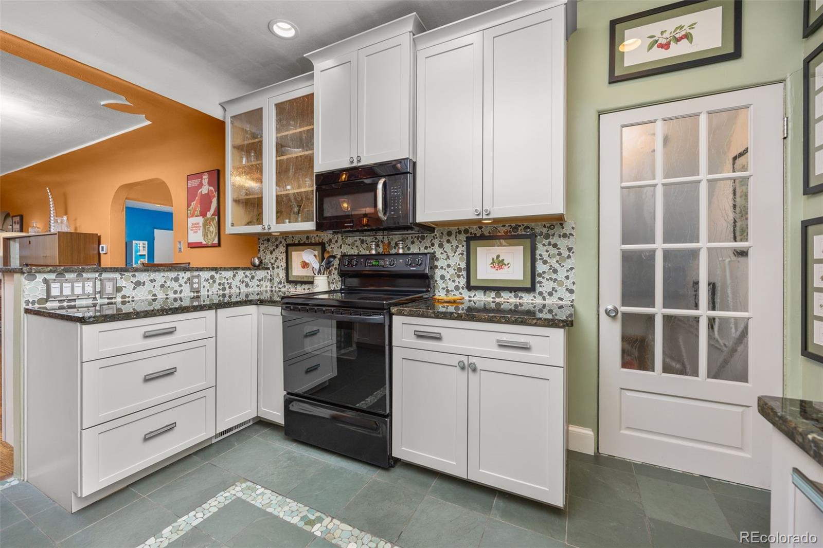 2514 Humboldt Street Denver, CO 80205 - Photo 13 of 39 a kitchen with appliances cabinets and a sink