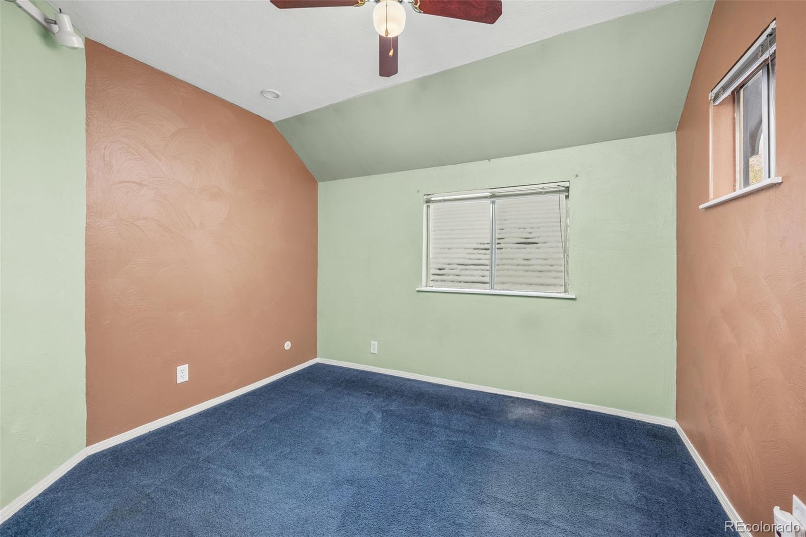 2514 Humboldt Street Denver, CO 80205 - Photo 17 of 39 an empty room with windows