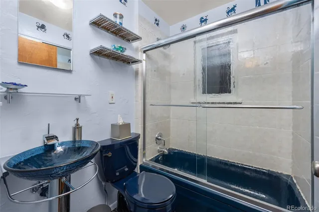 a view of room with furniture and a window