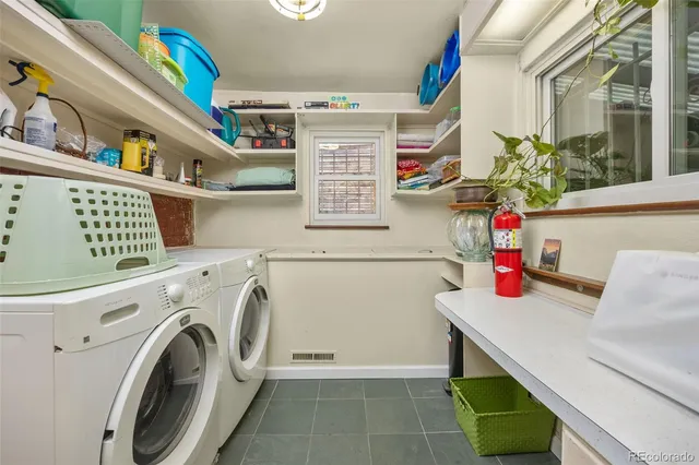 a bathroom with a tub sink and a mirror