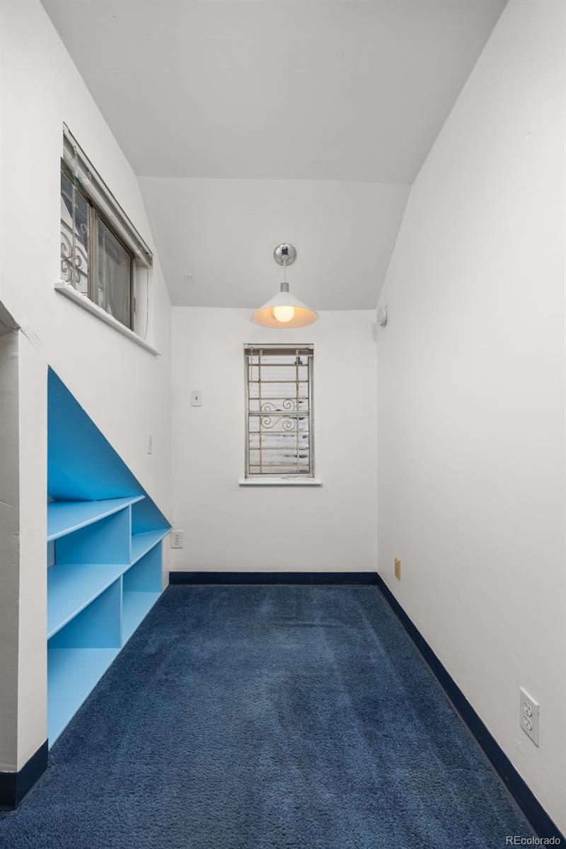 2514 Humboldt Street Denver, CO 80205 - Photo 29 of 39 an empty room with windows