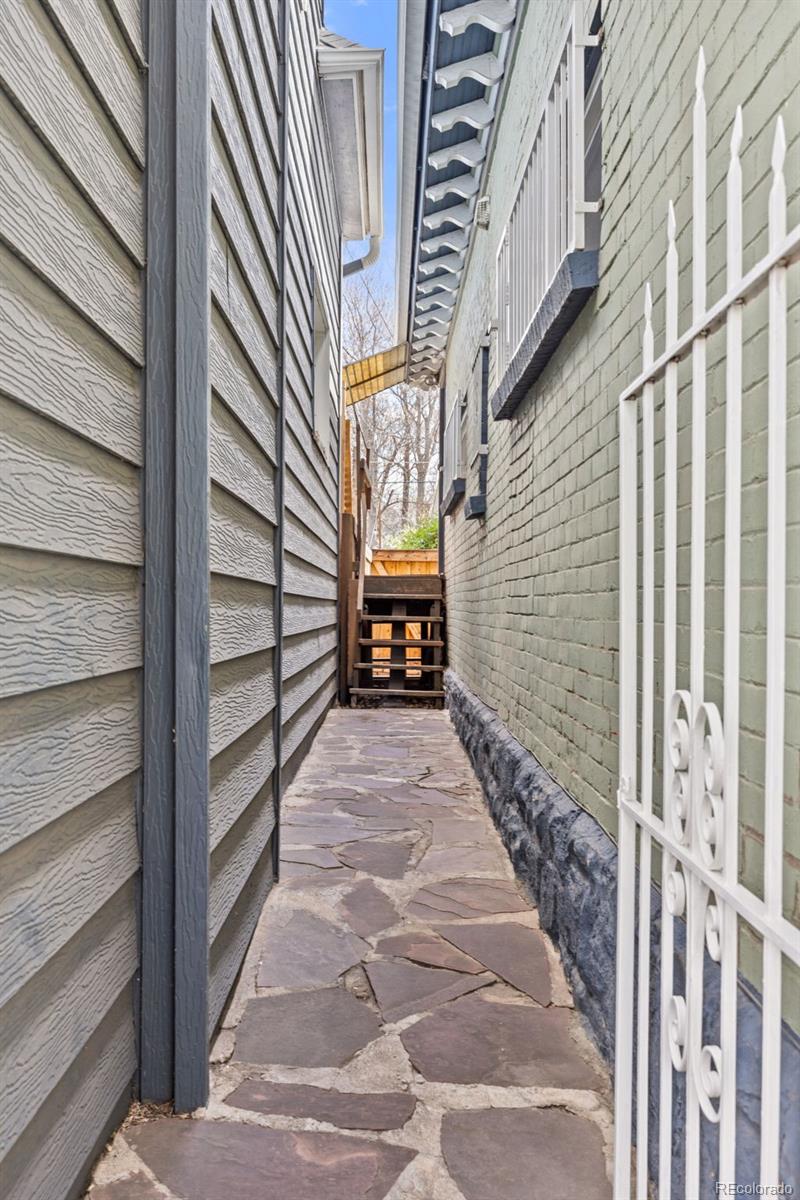 2514 Humboldt Street Denver, CO 80205 - Photo 32 of 39 a view of a pathway with a white house