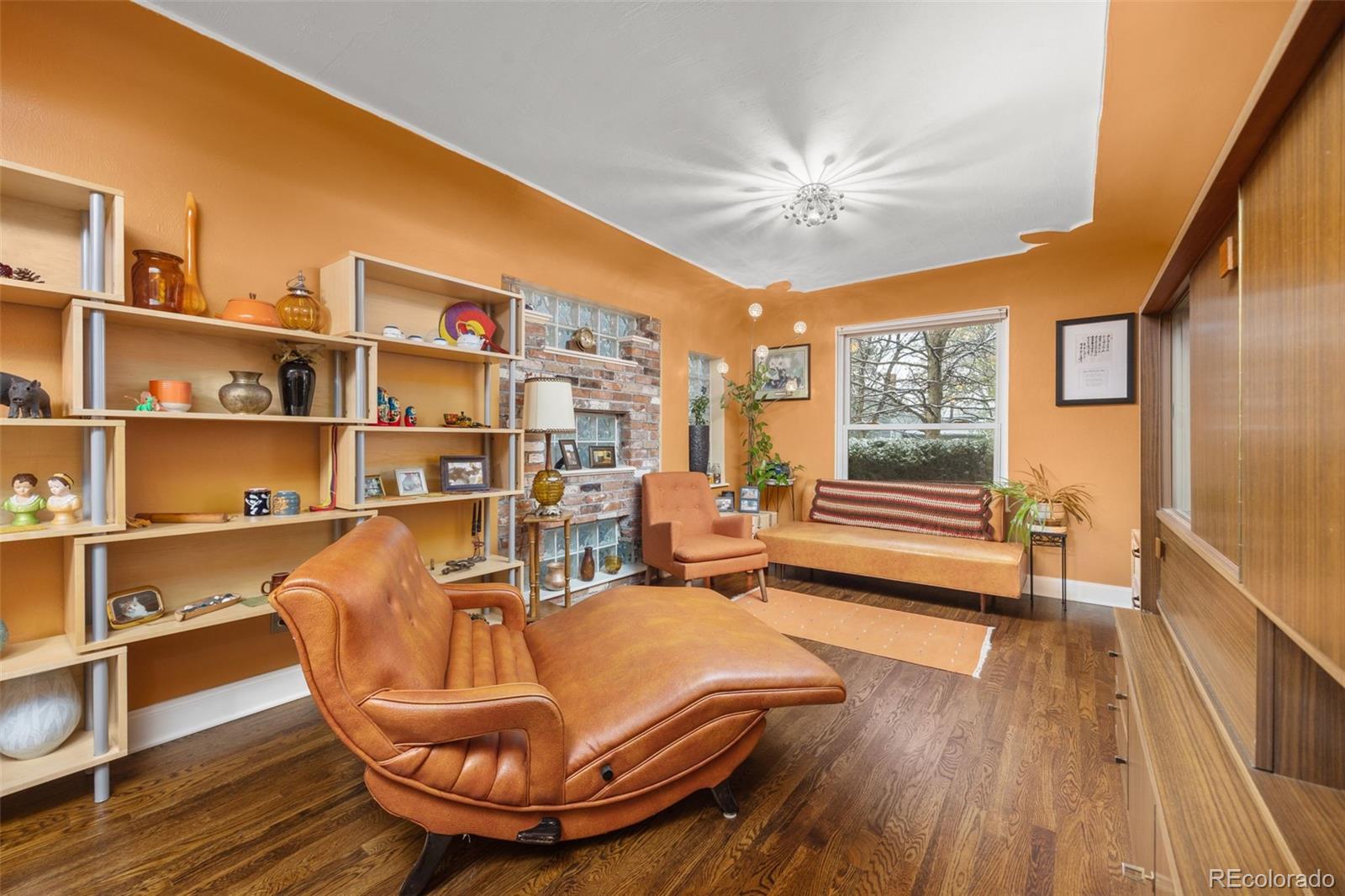 2514 Humboldt Street Denver, CO 80205 - Photo 9 of 39 a workspace with wooden floor and windows