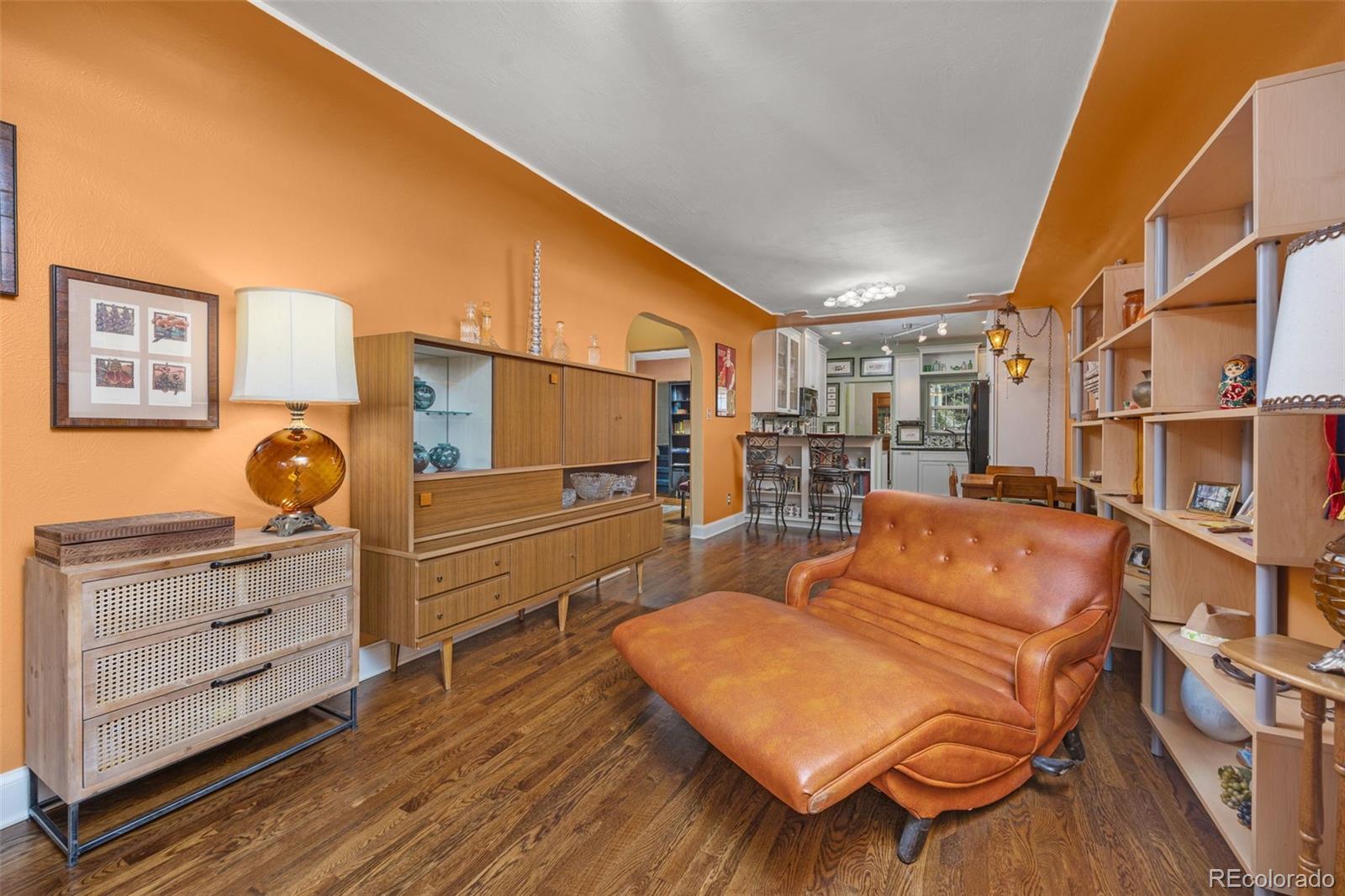 2514 Humboldt Street Denver, CO 80205 - Photo 10 of 39 a room with wooden floor and furniture