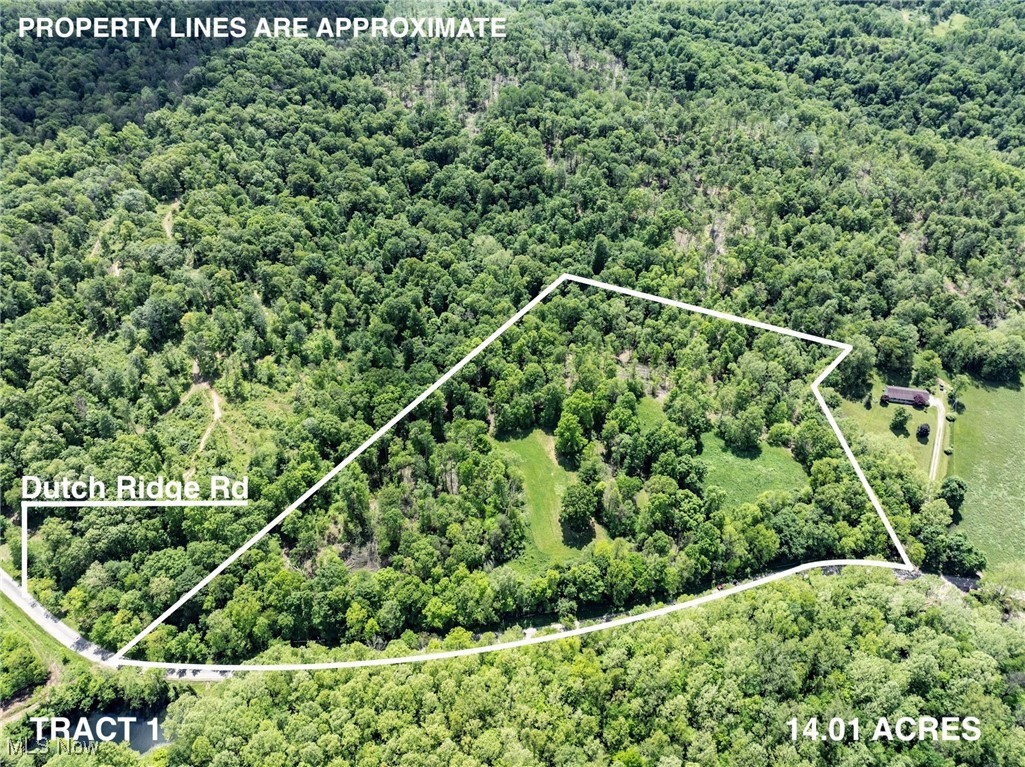 0 Dutch Ridge Road New Straitsville, OH 43766 - Photo 1 of 28 Aerial view of property and surrounding area with a heavily wooded area and property parcel outlined