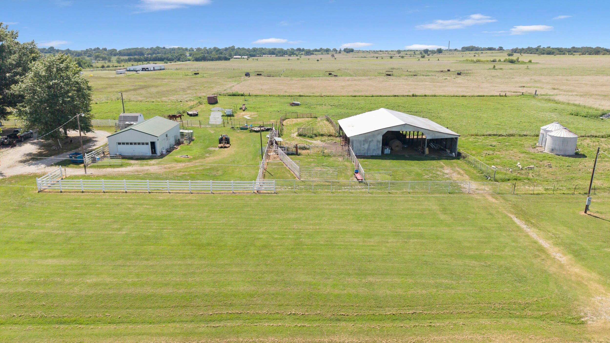 14901 South 540 Road Miami, OK 74354 - Photo 13 of 15 shop and Barn Drone Shot
