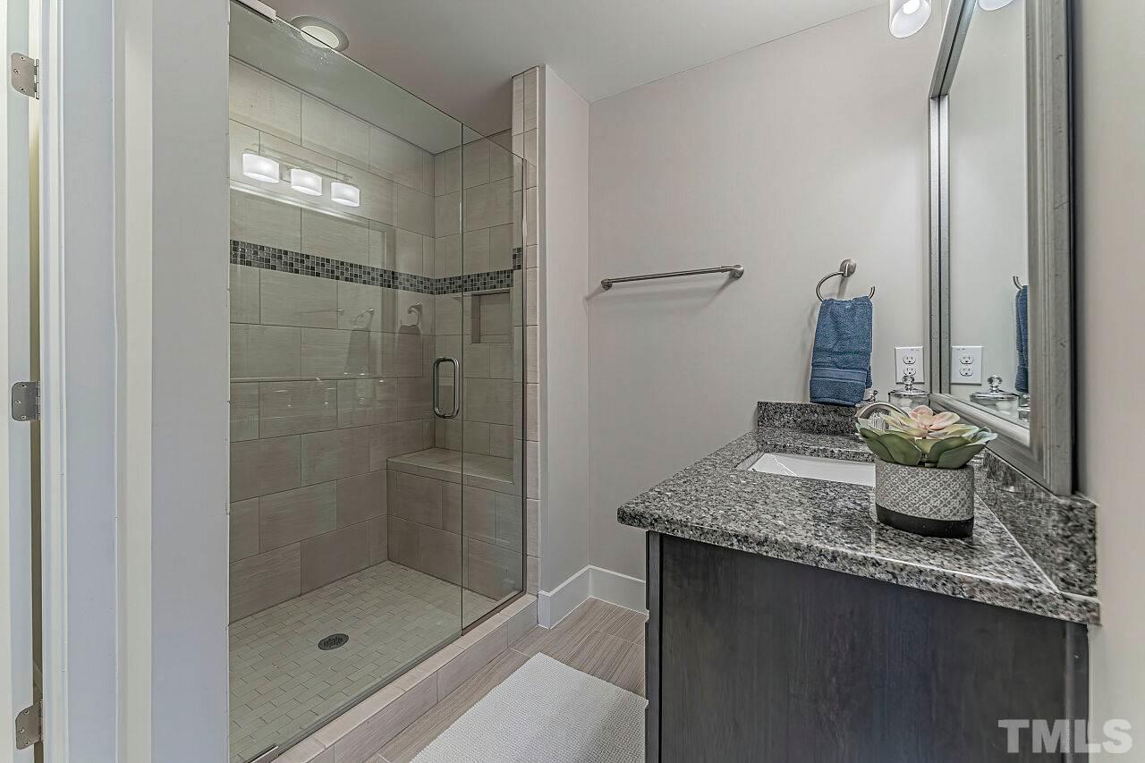 511 North Person Street, Unit 207 Raleigh, NC 27604 - Photo 13 of 17 Master Bath with oversized tile shower