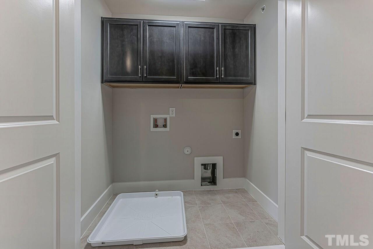 511 North Person Street, Unit 207 Raleigh, NC 27604 - Photo 14 of 17 Upper level laundry!