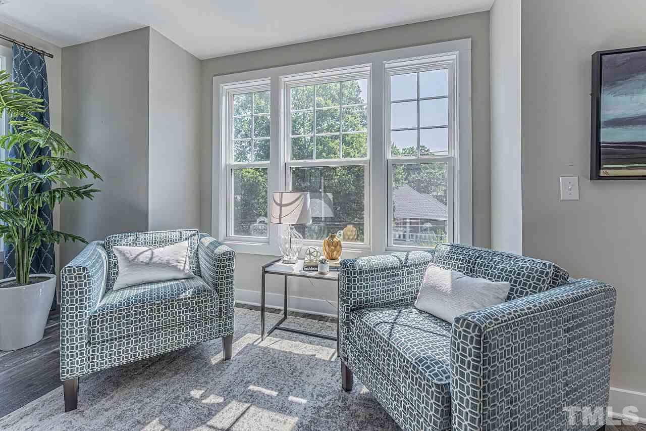 511 North Person Street, Unit 207 Raleigh, NC 27604 - Photo 8 of 17 lots of natural light in living area