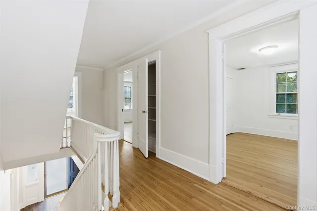 a view of entryway with wooden floor