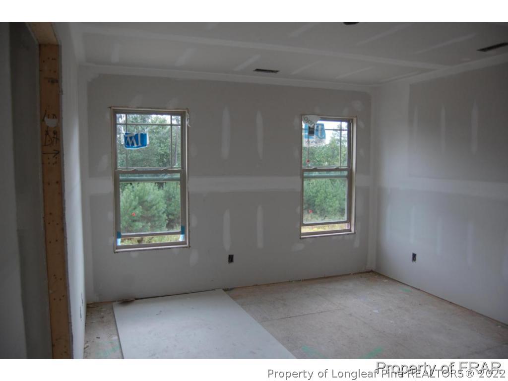 11 Rockingham Street Spring Lake, NC 28390 - Photo 13 of 14 a view of an empty room with a window