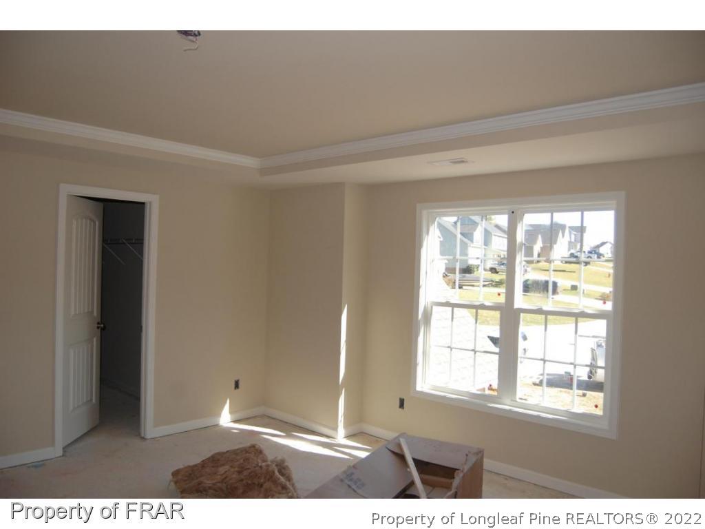 11 Rockingham Street Spring Lake, NC 28390 - Photo 5 of 14 a view of an empty room with a window