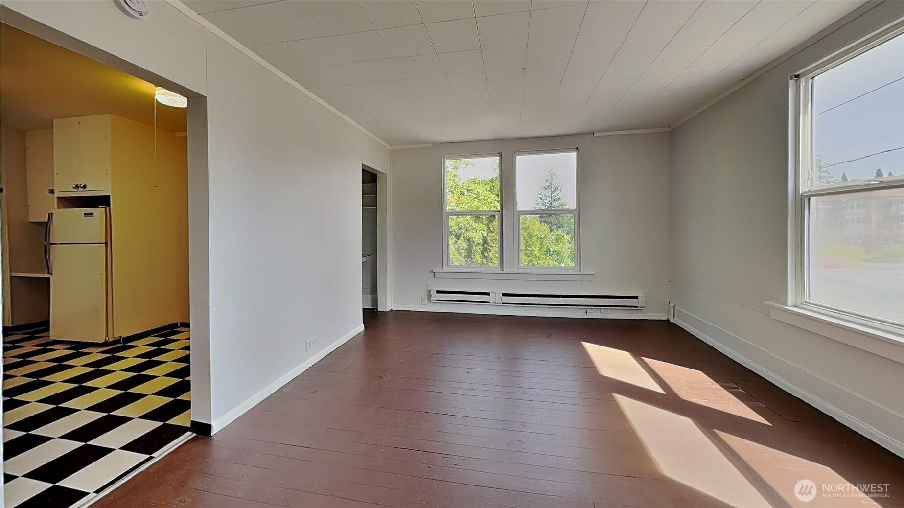 4700 Southwest Othello Street Seattle, WA 98136 - Photo 13 of 17 a view of a room with window and wooden floor