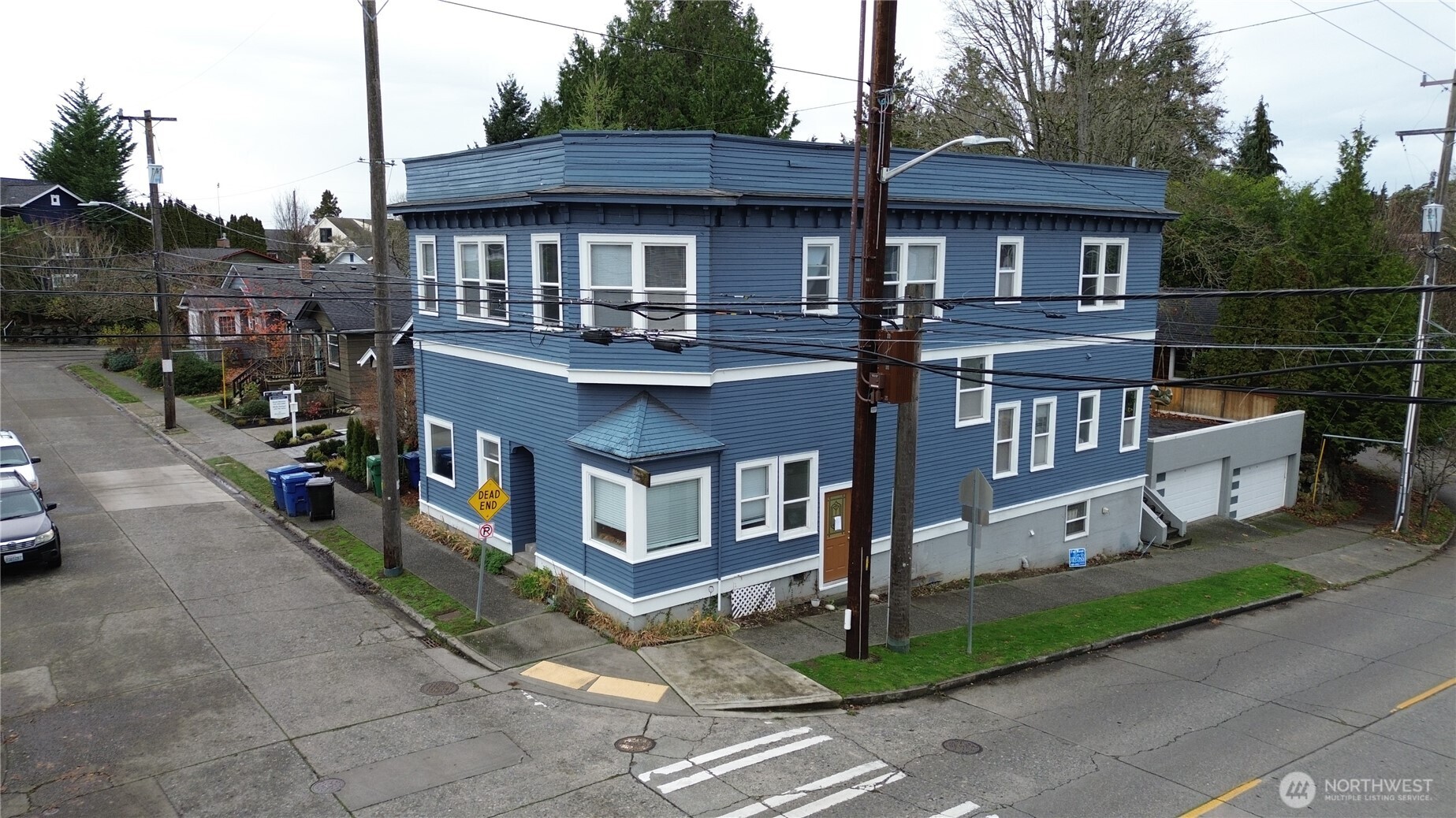 4700 Southwest Othello Street Seattle, WA 98136 - Photo 3 of 17 a view of multiple houses with a small yard