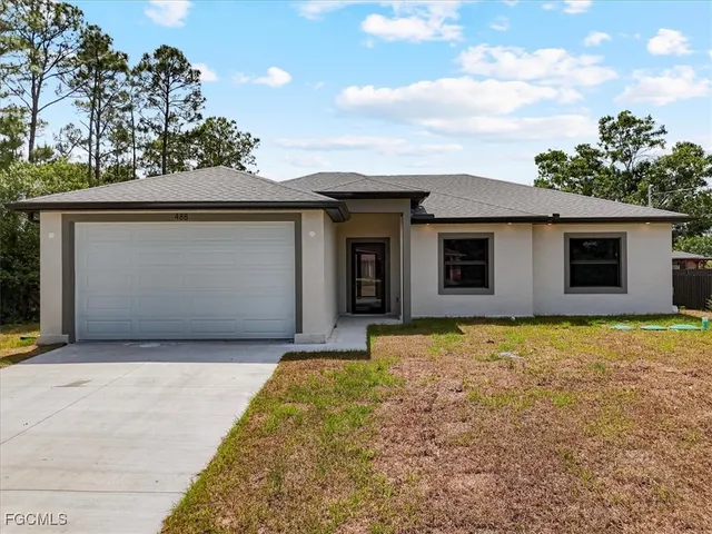 a front view of house with yard