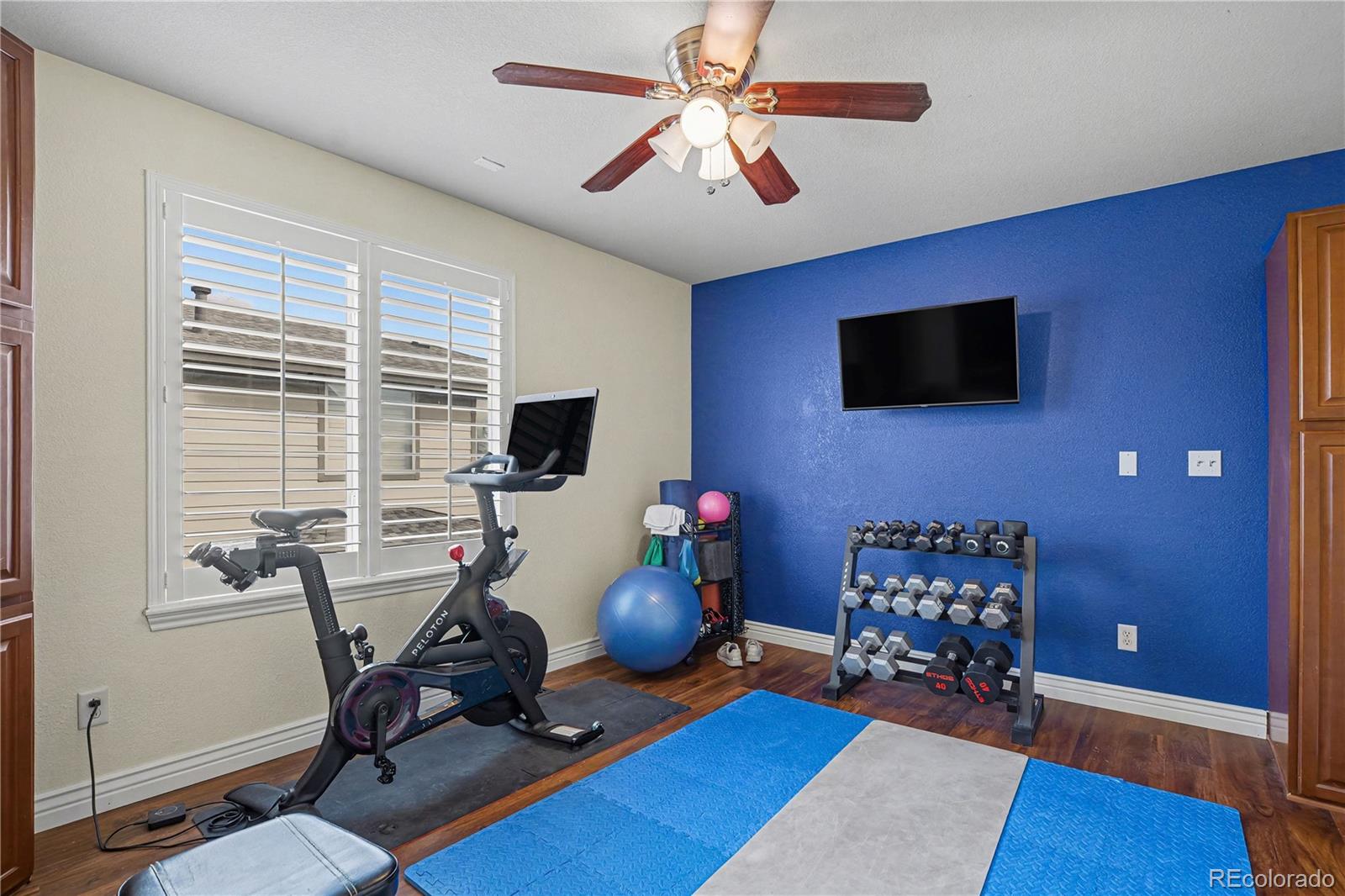 10871 Chambers Way Commerce City, CO 80022 - Photo 26 of 50 a livingroom with furniture and a flat screen tv