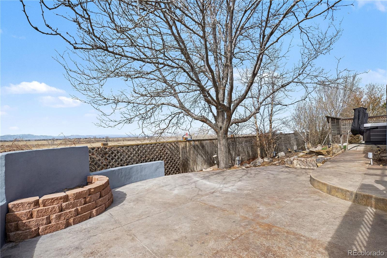 10871 Chambers Way Commerce City, CO 80022 - Photo 45 of 50 a view of roof with wooden fence