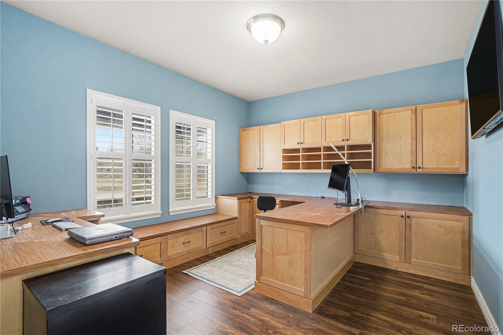 10871 Chambers Way Commerce City, CO 80022 - Photo 5 of 50 a room with a table chairs and a sink