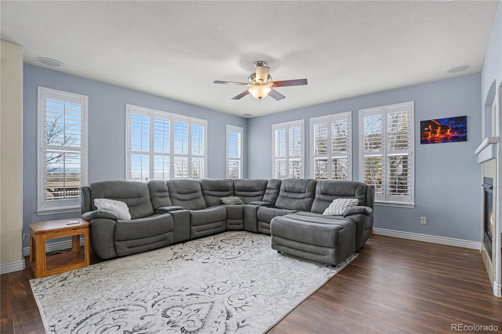 10871 Chambers Way Commerce City, CO 80022 - Photo 10 of 50 a living room with furniture and a window