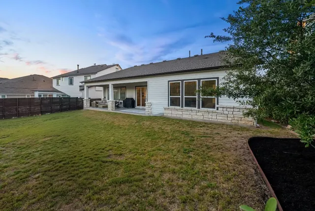 a house view with a garden space