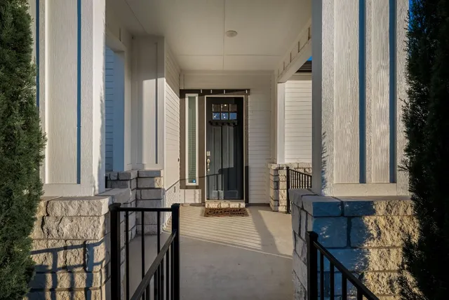 a view of front door with glass door