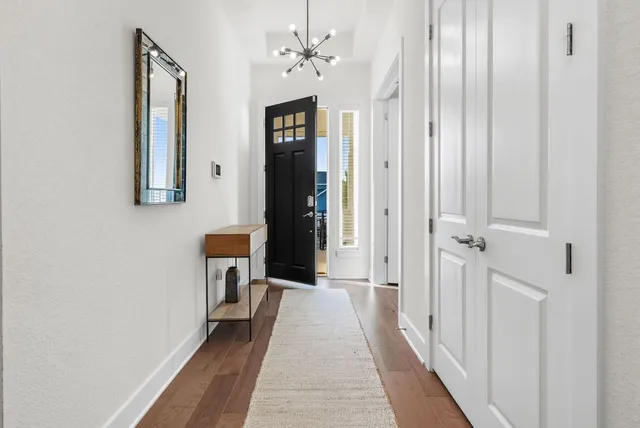 a view of a bathroom from the hallway