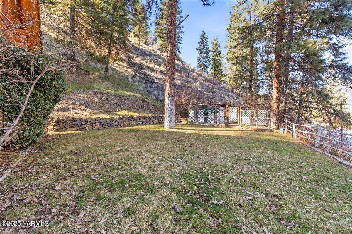 4492 Nile Road Naches, WA 98937 - Photo 32 of 38 a view of outdoor space with deck and tree