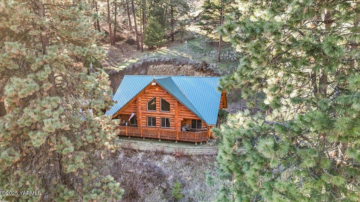 4492 Nile Road Naches, WA 98937 - Photo 36 of 38 a aerial view of a house with a yard and sitting area