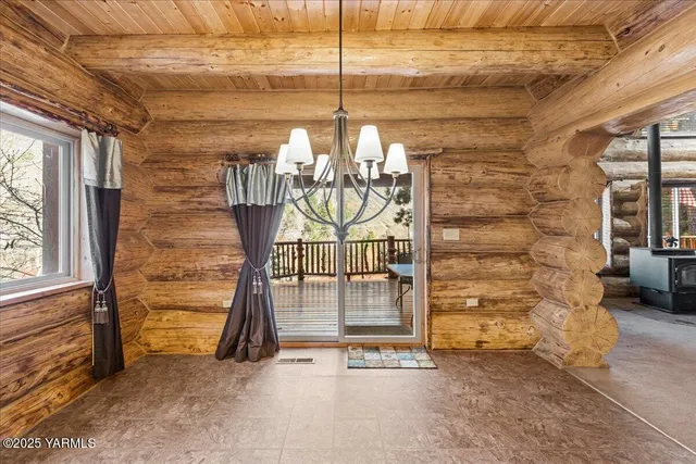 a view of water heater room with window