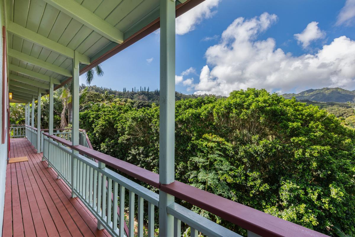24 Off Moloaa Road Kilauea, HI 96754 - Photo 11 of 25 a view of a balcony with flower plants