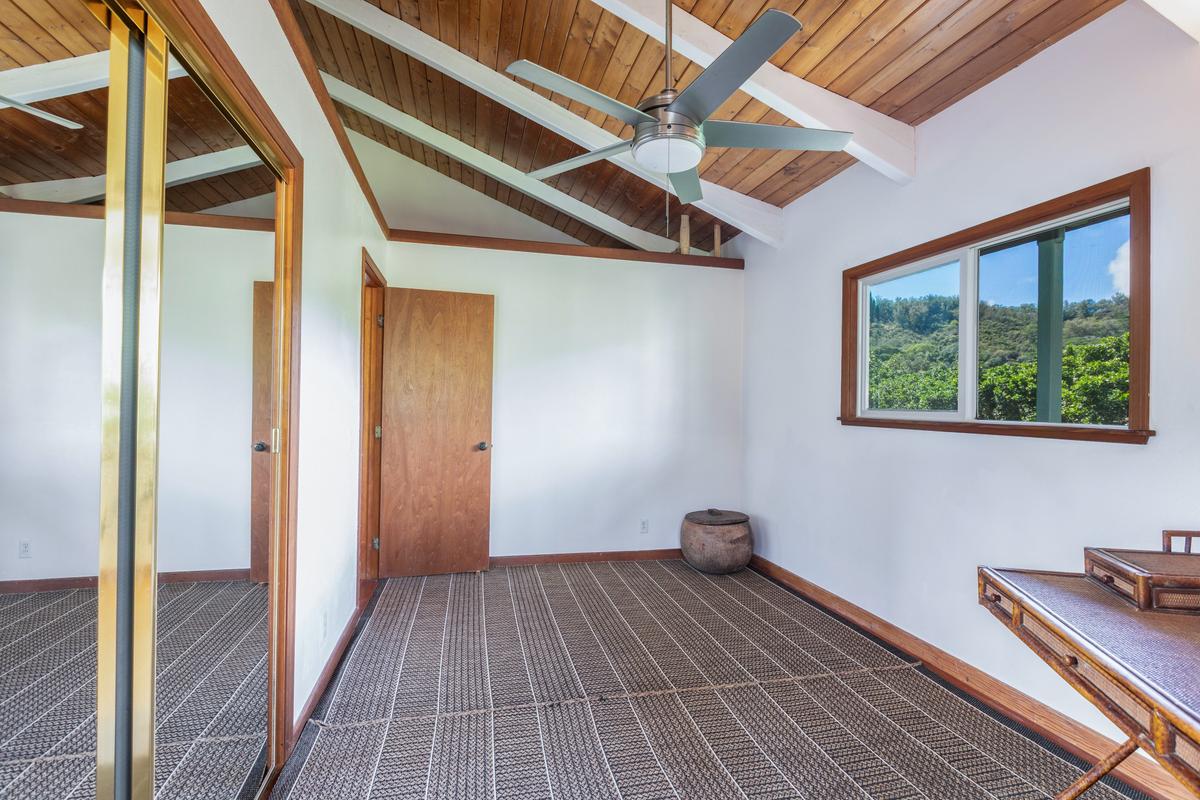 24 Off Moloaa Road Kilauea, HI 96754 - Photo 18 of 25 a view of a house with wooden floor