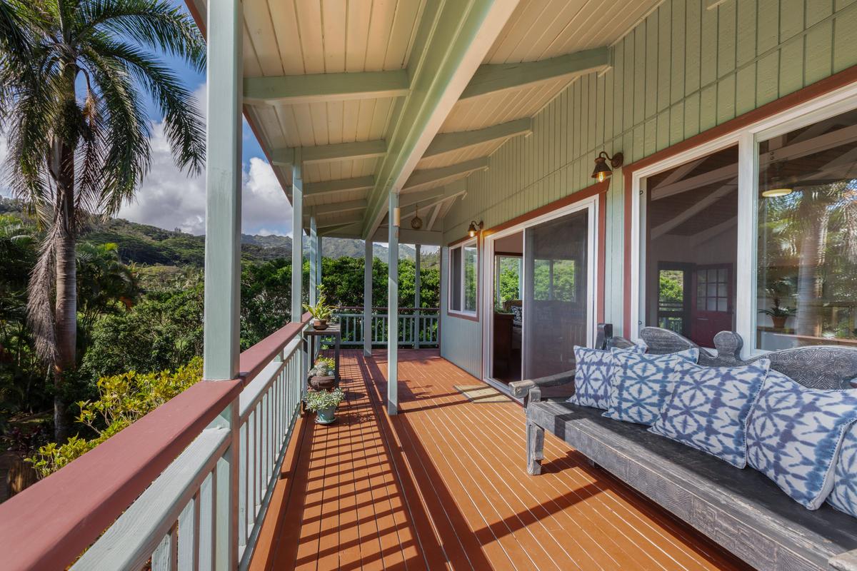 24 Off Moloaa Road Kilauea, HI 96754 - Photo 10 of 25 a balcony with furniture and a potted plant