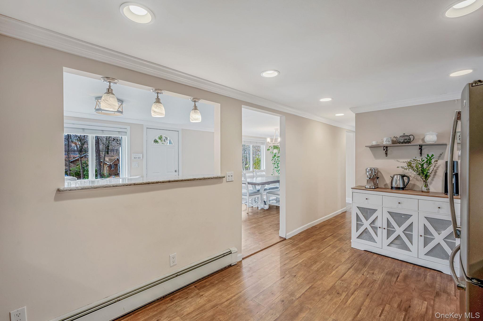 5 Valley Circle Miller Place, NY 11764 - Photo 15 of 38 a view of kitchen with furniture and wooden floor