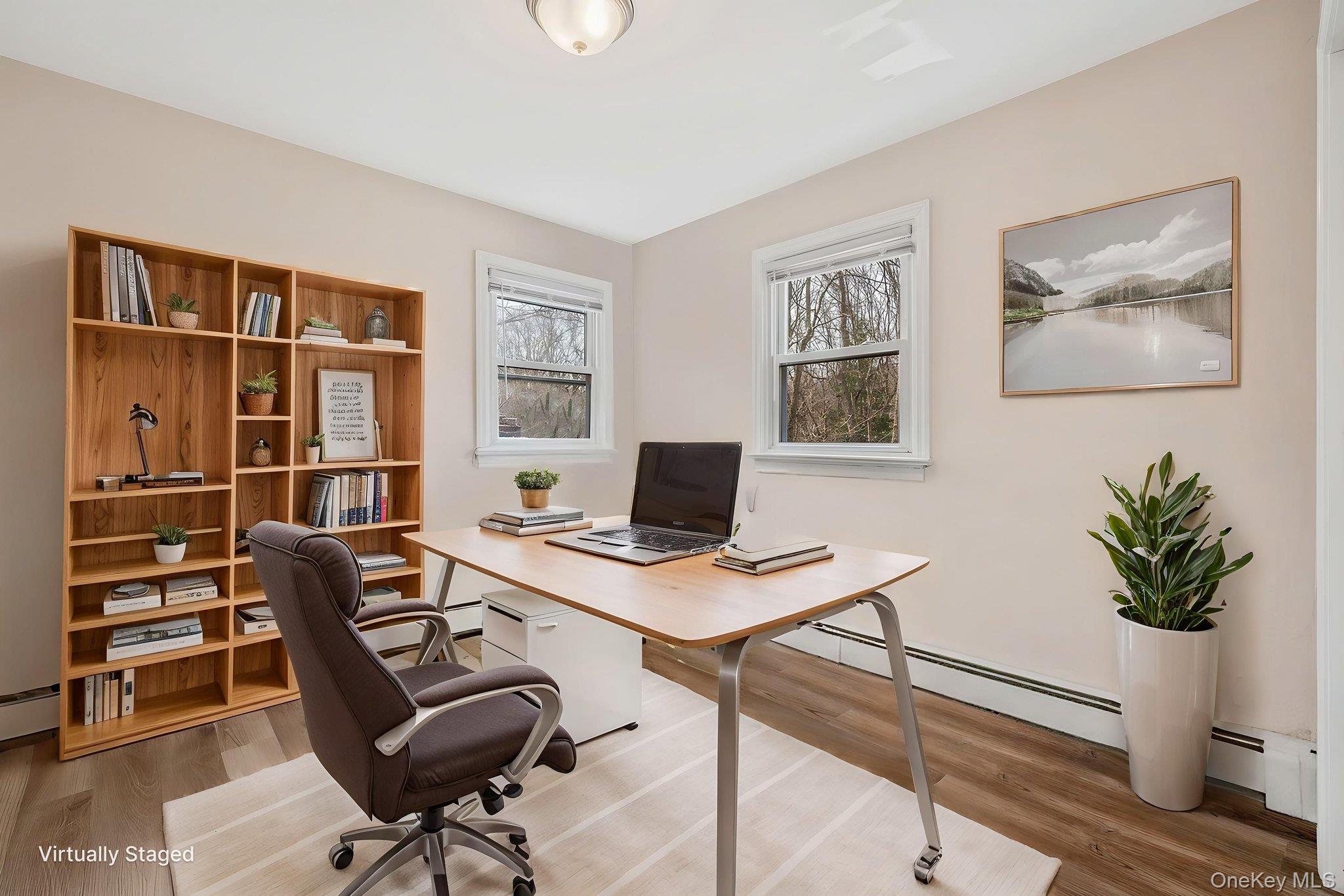 5 Valley Circle Miller Place, NY 11764 - Photo 21 of 38 a view of a workspace with furniture and a potted plant
