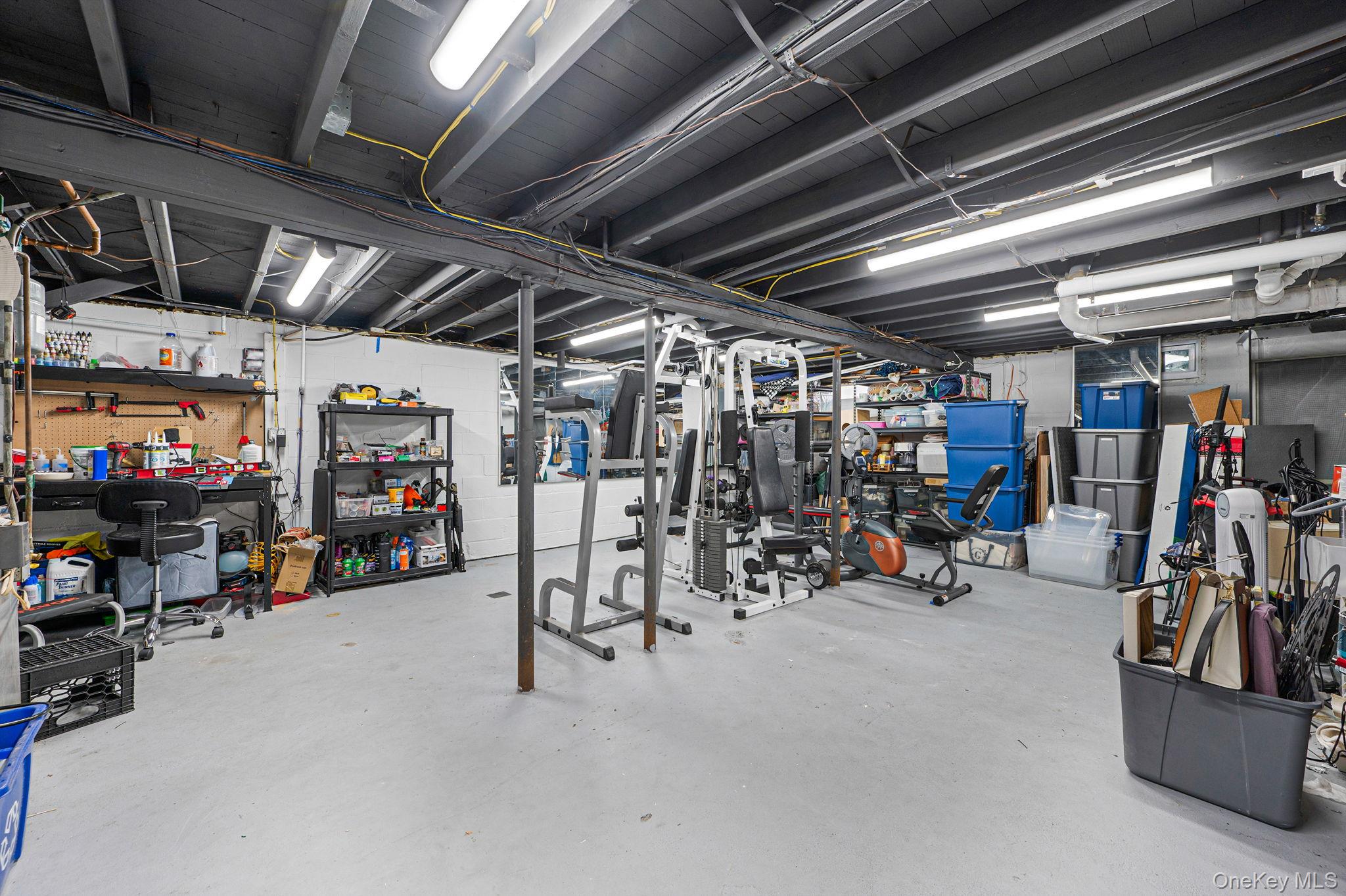 5 Valley Circle Miller Place, NY 11764 - Photo 27 of 38 a view of a storage room with gym equipment