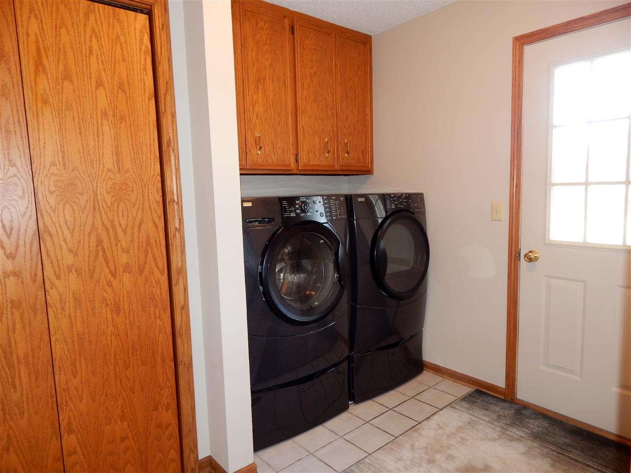 10001 Atwood Road Roscoe, IL 61073 - Photo 11 of 24 a utility room with dryer and washer