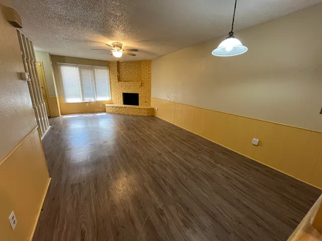 a view of a livingroom with a fireplace