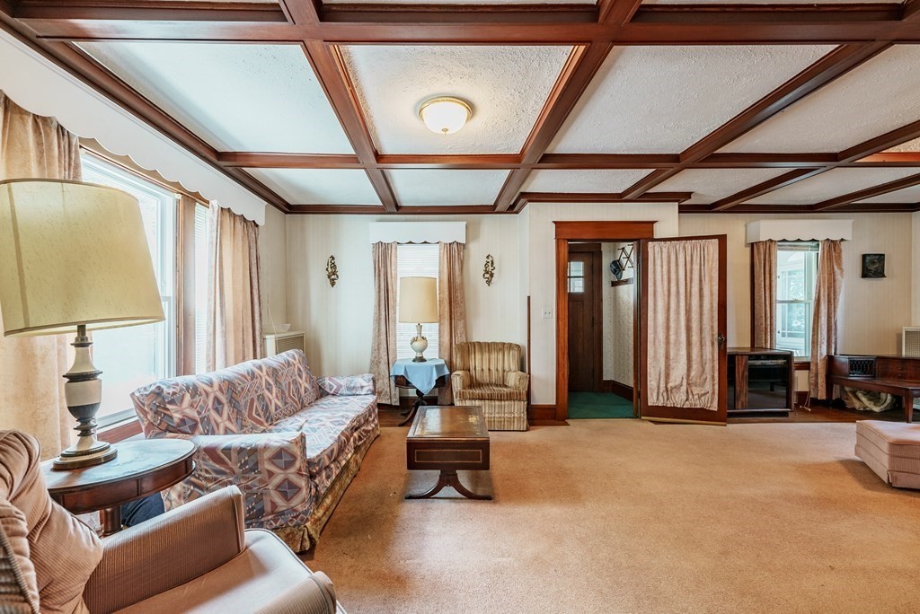 73 Sunapee Street Springfield, MA 01108 - Photo 11 of 40 a living room with furniture and a large window