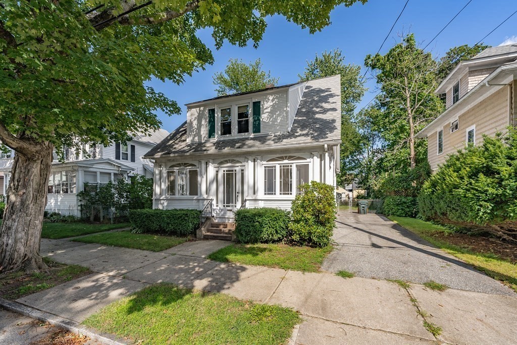 73 Sunapee Street Springfield, MA 01108 - Photo 2 of 40 a front view of a house with a yard