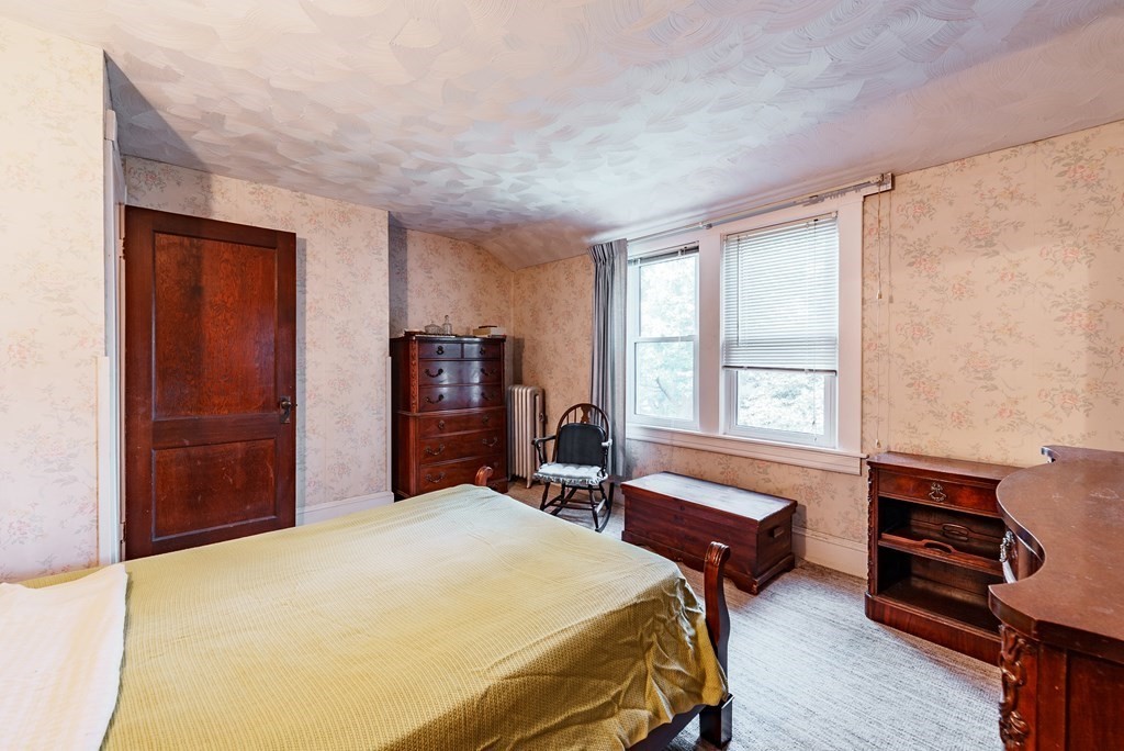 73 Sunapee Street Springfield, MA 01108 - Photo 22 of 40 a bedroom with a bed and a closet